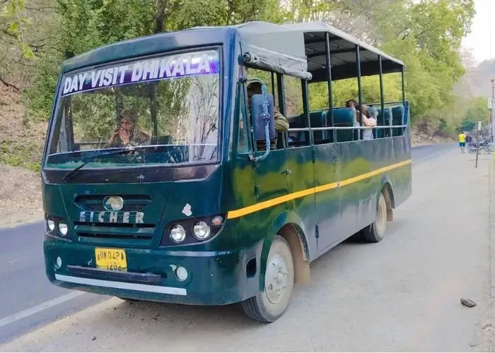 Group canter safari vehicle in Corbett buffer zone